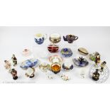 A collection of miniature wares, to include; teacups and saucer, Royal Crown Derby, Coalport,