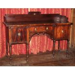 An early 19th century mahogany inverted breakfront sideboard,
