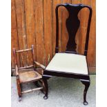 An Edwardian red walnut dining chair, with drop in seat, on cabriole legs, 106cm H,