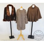 A 'House of Bruar' brown and oatmeal houndstooth collarless coat, with hook and button fastening,