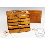 A Chinese Mahjong set within oak box enclosing five drawers of gaming counters, case 17cm H x 24.