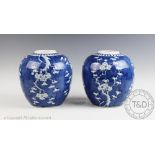 A pair of Chinese porcelain blue and white Prunus pattern ginger jars, early 20th century,