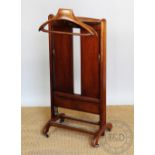 A vintage Harrods of London beech valet stand, Italian made,