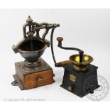 A Peugeot Freres cast iron coffee grinder, 33cm high and a J & J Siddons cast iron coffee grinder,