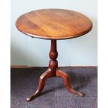 A George III style stained pine tripod table