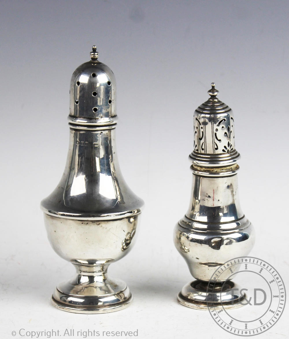 A sugar caster, J E Ltd, London 1926, of typical waisted form an a circular loaded foot,