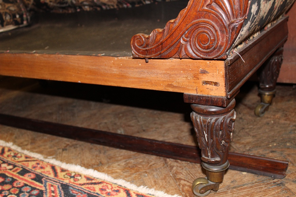 An early 19th century carved rosewood scroll end settee / day bed, on carved and turned legs, - Image 4 of 10