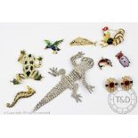 A collection of costume jewellery, to include; an articulated paste set lizard brooch 15.