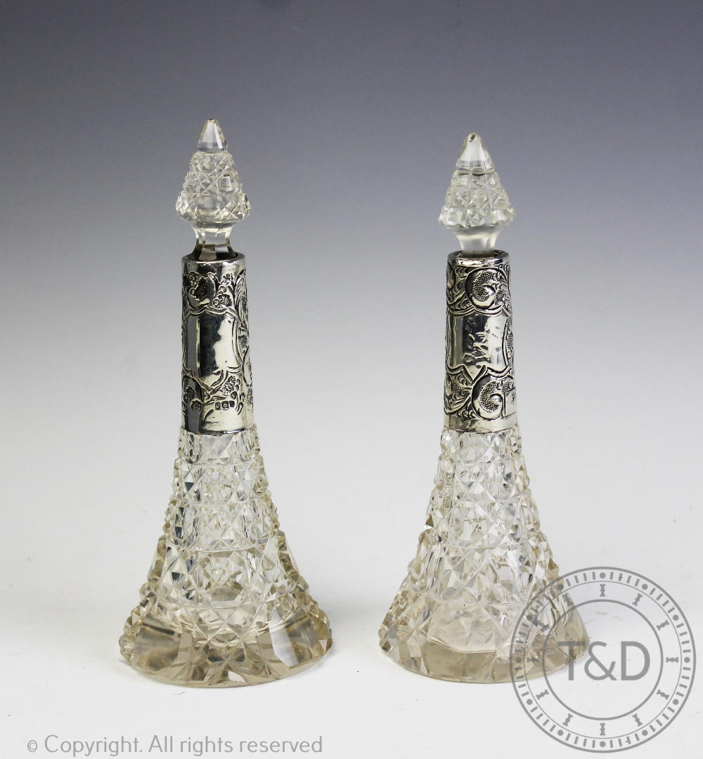 An associated pair of silver mounted perfume bottles and stoppers, J H Worrall Son & Co Ltd, 16.