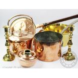 A collection of assorted copper and brass wares, to include; a copper kettle,