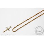 A 9ct yellow gold cross pendant with an attached yellow metal chain, unmarked, gross weight 9.