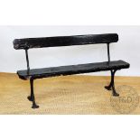 A late Victorian cast iron and painted wood station type bench,