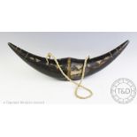 An unusual Indian tribal art Naga Land double head hunter buffalo horn chest piece,