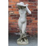 A reconstituted stone garden figure of a maiden, on canted rectangular base,