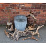 A vintage galvanized wash tub, 47cm high, with a wash dolly,