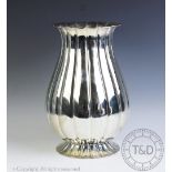 A large Continental '800' standard silver centrepiece, the vase of lobed waisted and tapering form,