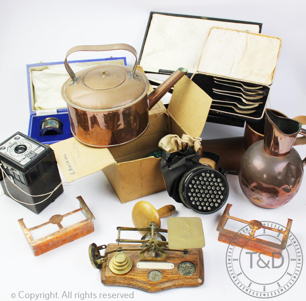 A selection of vintage items, to include a copper ale warmer, a gas mask, postal scales,