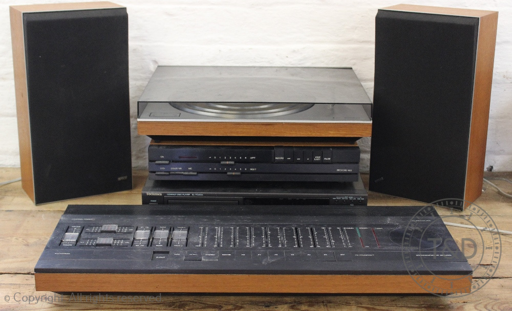 A selection of Bang and Olufsen hi-fi, compriging a B&O Beomaster 3400, a B&O tape deck type 6212,