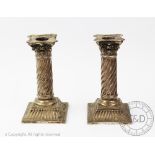 A pair of Victorian silver candlesticks, Martin Hall & Co, London 1886,
