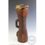 A Papua New Guinea carved Highlands drum with lizard skin top,