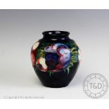 A Moorcroft anemone pattern vase, impressed marks,