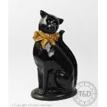 An early 20th century cast iron, novelty door porter/ fire companion,