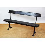 A late Victorian cast iron and painted wood station type bench,