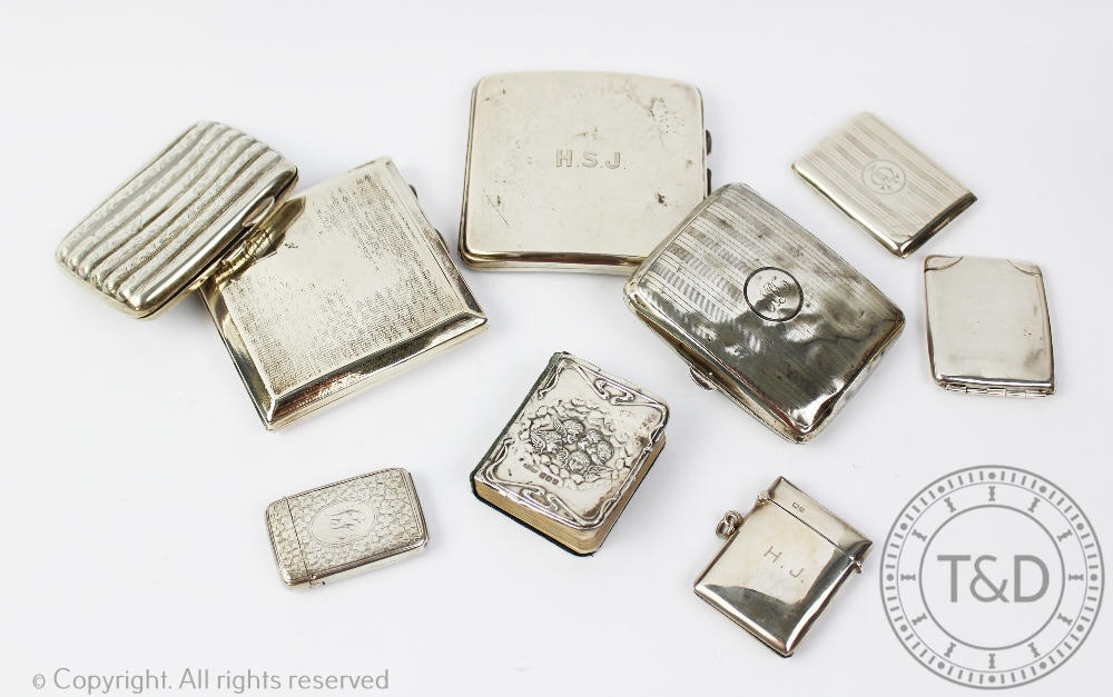 Four silver cigarette cases, with four silver vesta vases, 14.