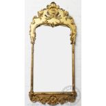 A George II style mirror gilt wood and gesso mirror, with pierced shell shaped crest,