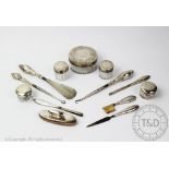 A selection of silver mounted dressing table items to include a Victorian set of three jars,