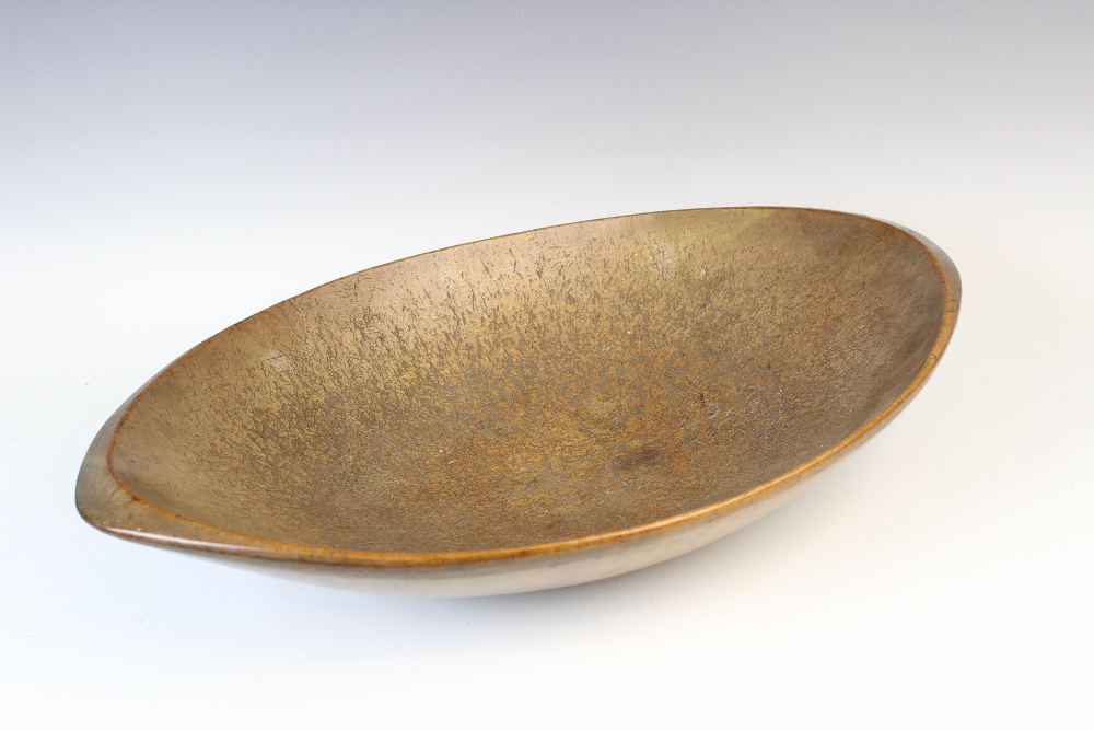 A 19th century vernacular treen sycamore oval settling bowl, 58cm wide Provenance: Clynog Farmhouse, - Image 2 of 8