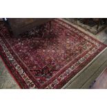 A Caucasian hand woven wool carpet,