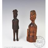 Two East African Kamba tribe colonial era carved wood Askari figures,
