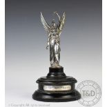A silver figural statue of a winged Britannia, London,