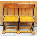 Stoke City Football Club - a section of two vintage seats, cast iron and wood,