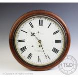 A 19th century walnut cased circular wall clock, dial named J.