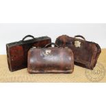 Two Gladstone type bags and a leather suitcase (3) Provenance: Clynog Farmhouse,