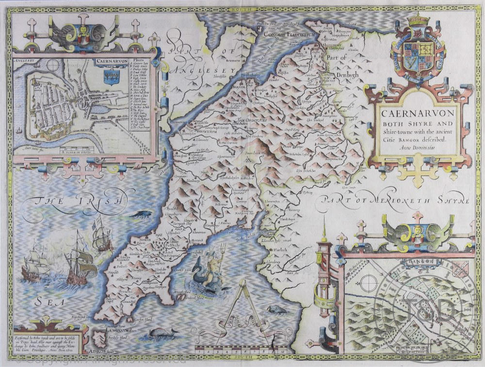 John Speed, 17th century engraved map with later hand colouring, Map of Caernarvon, 39cm x 52cm,