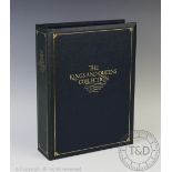 An album containing 'The Kings and Queens collection' of commemorative coins,