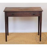 A George III mahogany side table, with drawer, on tapered square legs,