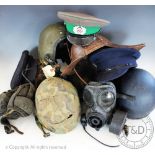 A quantity of military and other helmets, WWII and later, to include; Army, RAF,
