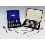 A selection of silver flatware to include an Edwardian cased set of six silver teaspoons,