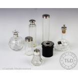 An assorted collection of silver mounted dressing table jars and bottles,