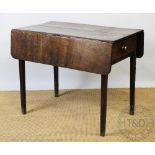 A George III oak Pembroke table, with drawer and on tapered square legs,