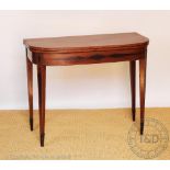 A 19th century inlaid mahogany card table, on tapered square legs,