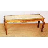 A Louis XV style gilt stool, with caned seat,