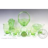 An Art Deco green glass decanter set,