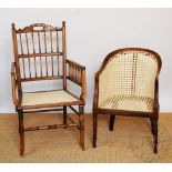 A 1920's childs beech tub chair, with caned back and seat, 65cm H,