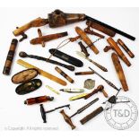 A quantity of 19th century and later treen and vintage items, comprising; barrel taps, corkscrews,