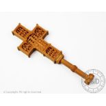 A carved boxwood Orthodox blessing cross, intricately carved with devotional and religious views,